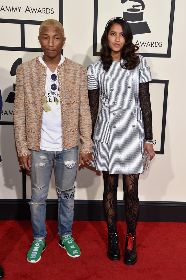 Pharrell Williams and his wife Helen Lasichanh attend the Chanel