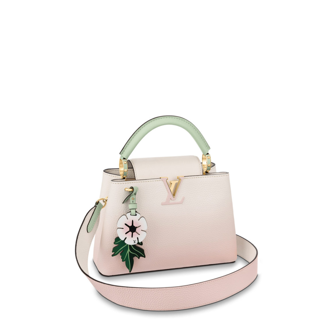 The chicest of companions. One of the new finishes on the #LouisVuitton  Capucines bag is an irresistible gradient effe…